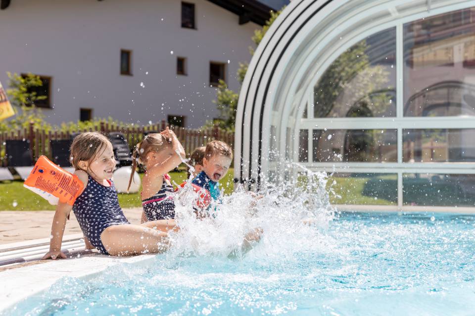 Kids are playing in the water